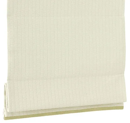 A rolled-up white textured fabric on a plain background.